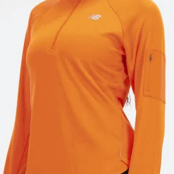 ODZIEZ BIEGOWA|BIEGANIE*New Balance ODZIEZ BIEGOWA|BIEGANIE Bluza damska WT23252CEN – pomarańczowa