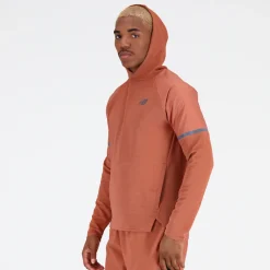 ODZIEZ BIEGOWA|BIEGANIE*New Balance ODZIEZ BIEGOWA|BIEGANIE Bluza męska MT31289MHY – pomarańczowe