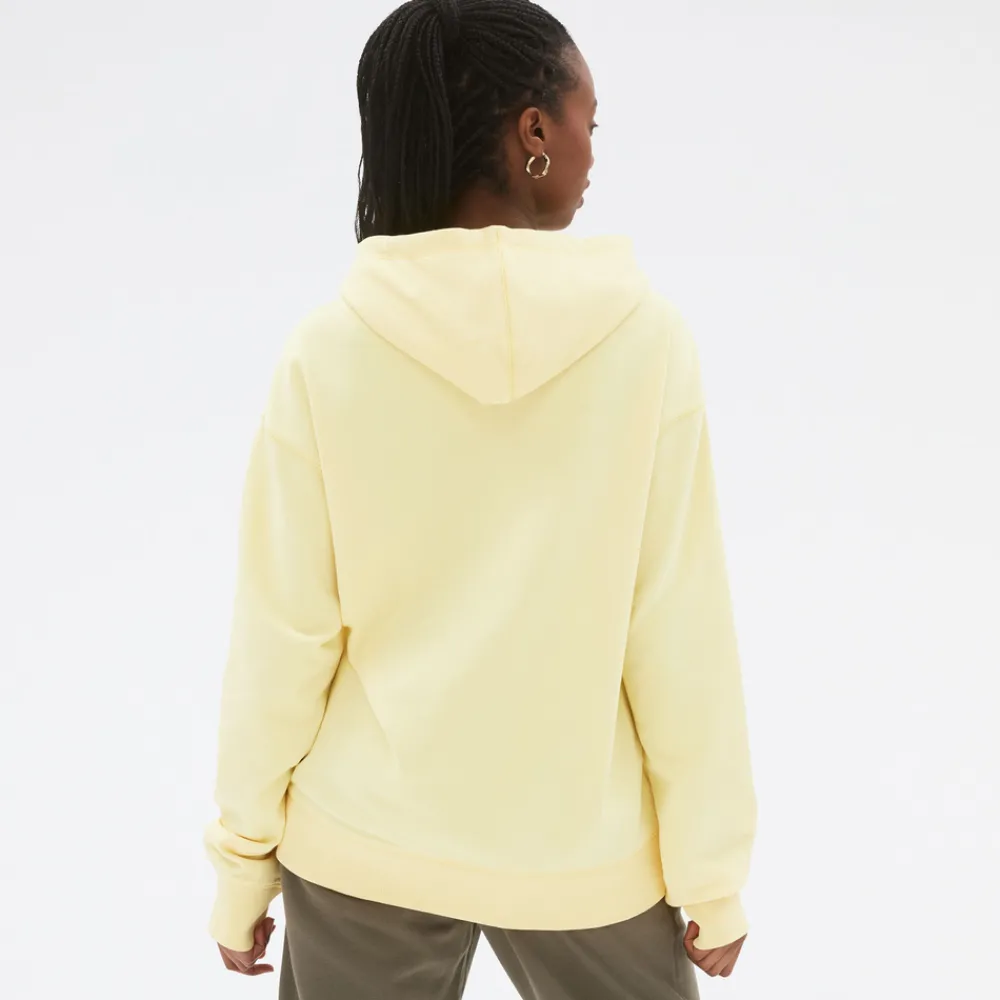New Balance Bluza unisex UT21500MZ – żółta