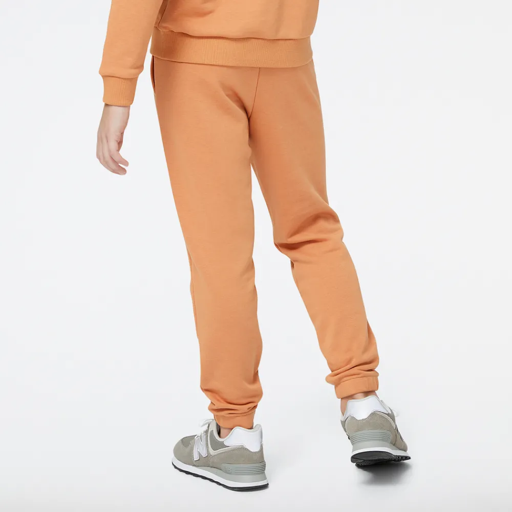 New Balance Spodnie dziecięce YP31508SEI – pomarańczowe