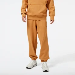New Balance Spodnie męskie MP23551TOB – pomarańczowe