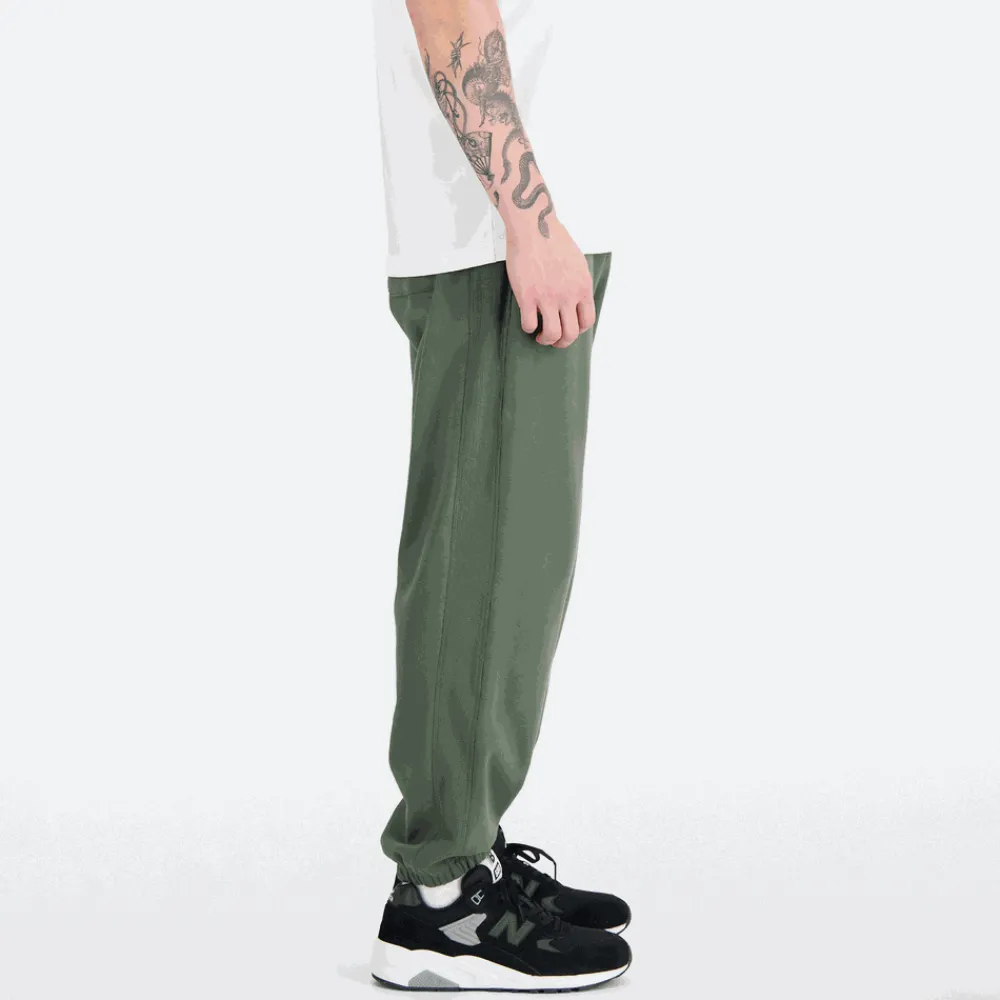 New Balance Spodnie męskie MP31503DON – zielone