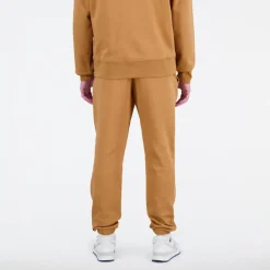 ODZIEZ BIEGOWA*New Balance ODZIEZ BIEGOWA Spodnie męskie MP31539TOB – brązowe