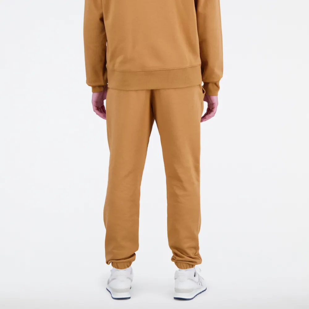 ODZIEZ BIEGOWA*New Balance ODZIEZ BIEGOWA Spodnie męskie MP31539TOB – brązowe