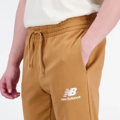 ODZIEZ BIEGOWA*New Balance ODZIEZ BIEGOWA Spodnie męskie MP31539TOB – brązowe