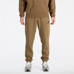 ODZIEZ BIEGOWA*New Balance ODZIEZ BIEGOWA Spodnie męskie MP31539DHE – brązowe