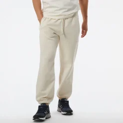 New Balance Spodnie męskie MP23551GIE – beżowe