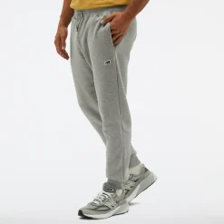 New Balance Spodnie męskie MP23600AG – szare
