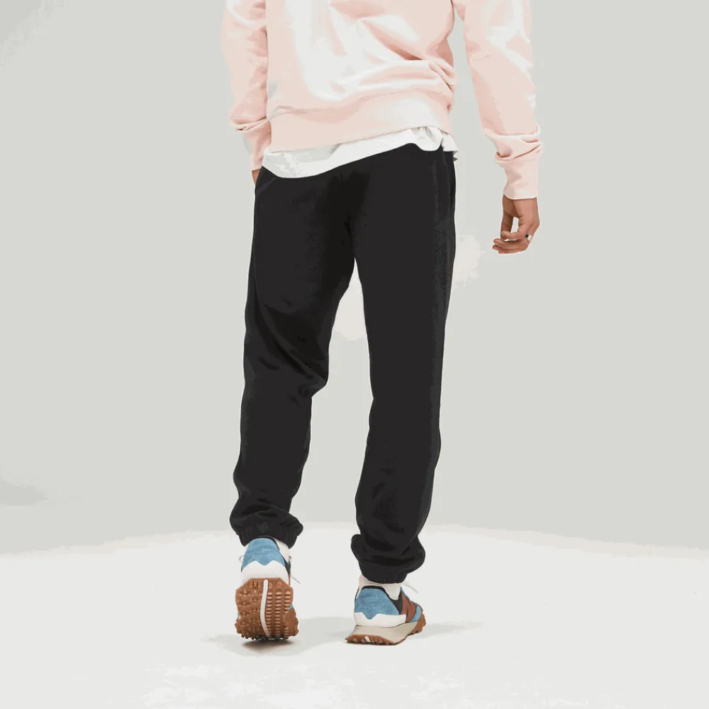 ODZIEZ BIEGOWA*New Balance ODZIEZ BIEGOWA Spodnie UP21500BK – czarne