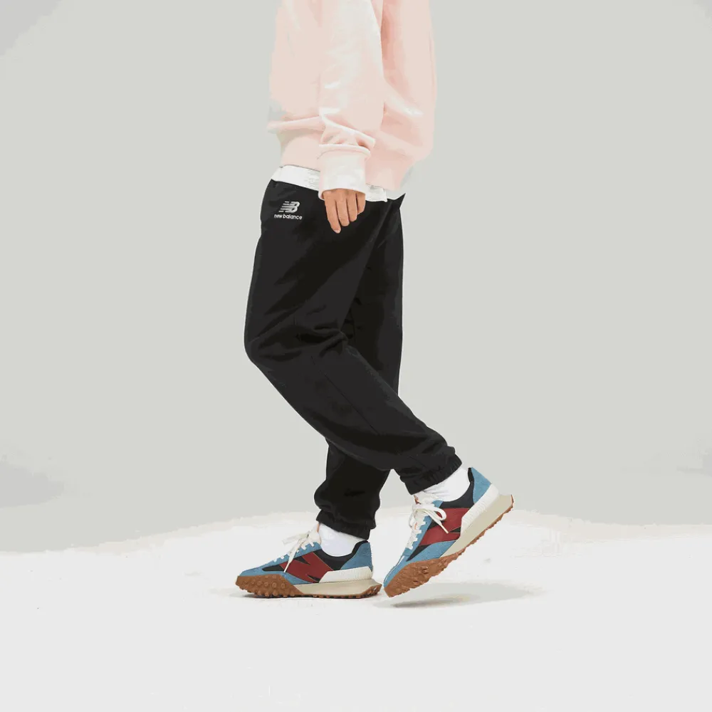 ODZIEZ BIEGOWA*New Balance ODZIEZ BIEGOWA Spodnie UP21500BK – czarne