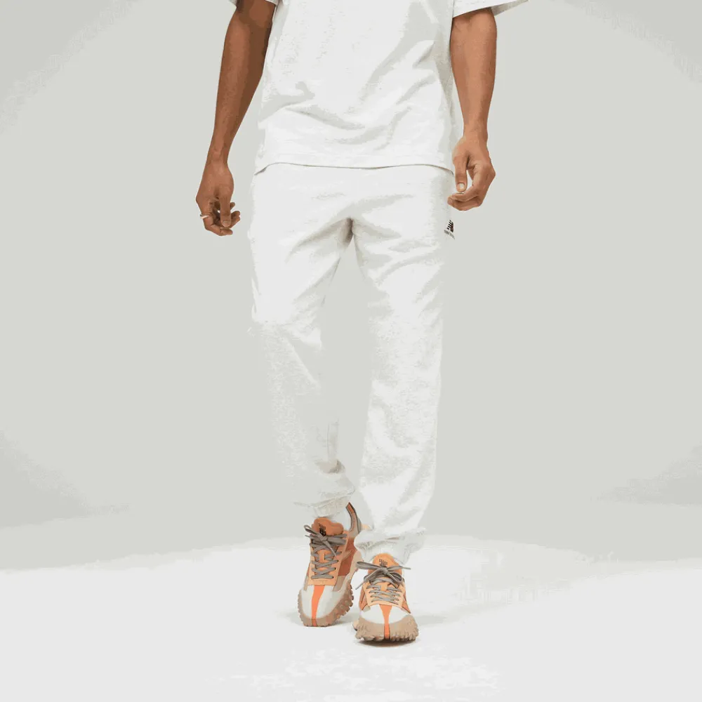 ODZIEZ BIEGOWA*New Balance ODZIEZ BIEGOWA Spodnie UP21500SAH – szare