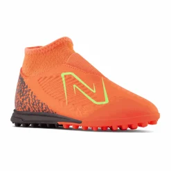 PIKANOENA*New Balance PIKANOENA Turfy dziecięce TEKELA V4 MAGIQUE JNR FG SJT3TDF4 – pomarańczowe